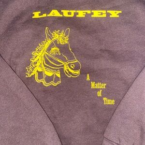 Laufey Brown Crewneck with Yellow Carousel Horse Graphic